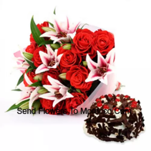 A Beautiful Hand Bunch Of Pink Roses And Pink Lilies Along With 1 Kg (2.2 lbs) Chocolate Crisp Cake