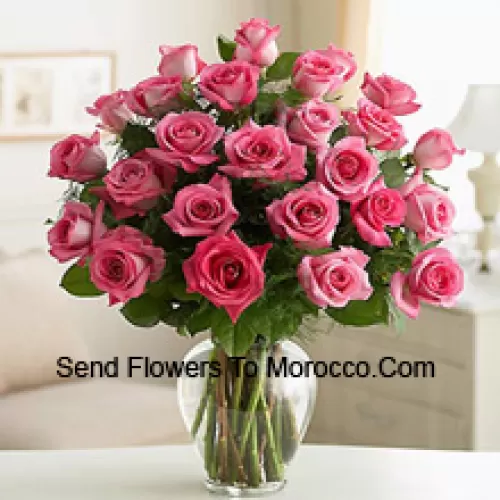 37 Pink Roses With Some Ferns In A Glass Vase