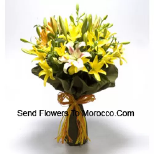 A Big Bunch Of Yellow And White Lilies With Seasonal Fillers