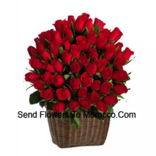 A Tall Basket Of 75 Red Roses With Seasonal Fillers