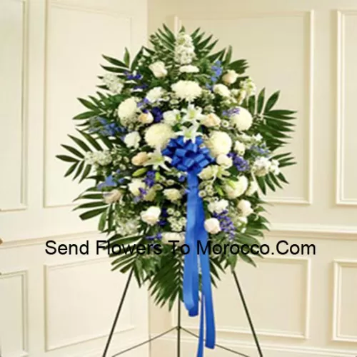 A Beautiful Sympathy Flower Arrangement That Comes With A Stand