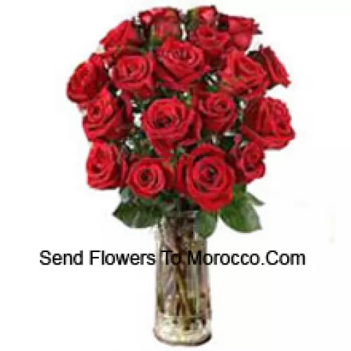 19 Red Roses With Some Ferns In A Vase