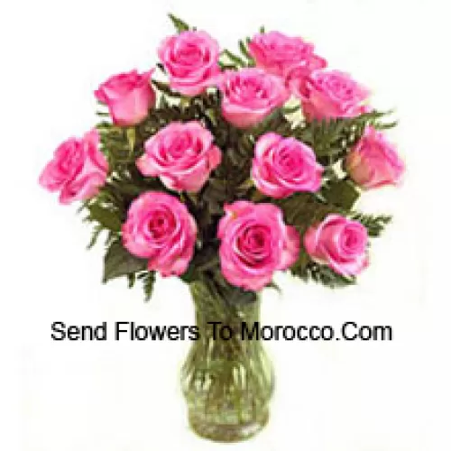 11 Pink Roses With Some Ferns In A Vase