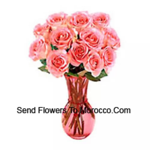 11 Roses roses roses dans un vase en verre