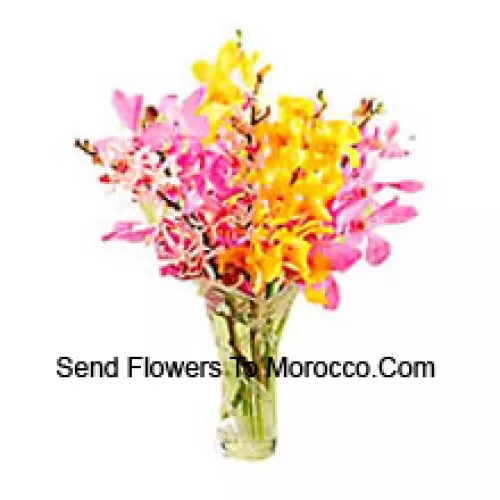 Mixed Colored Orchids In A Vase