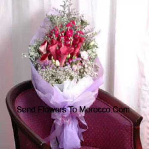 Hand Bunch Of Red Colored Tulips