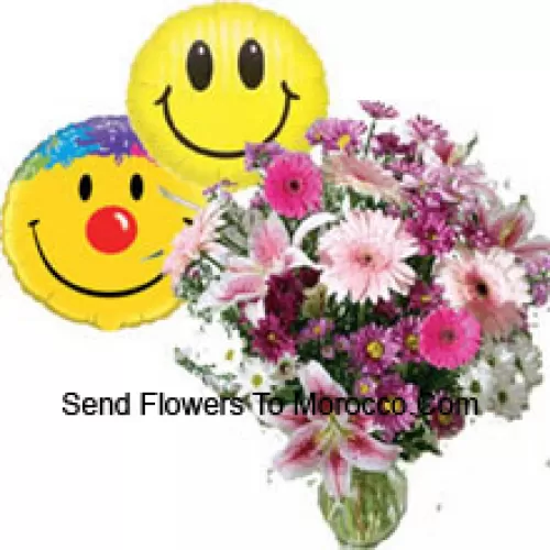 Assorted Flowers In A Vase Along With Smiley Balloons