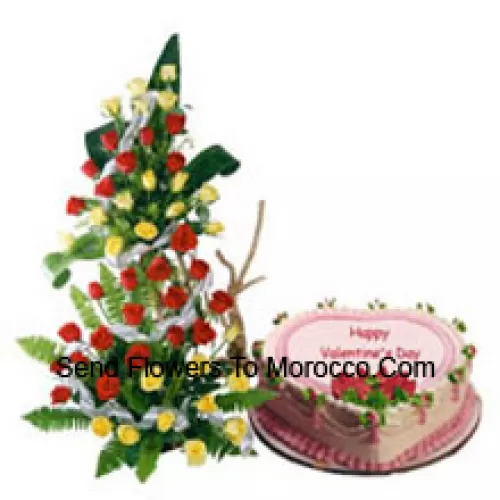 Tall Arrangement Of 101 Red Roses Along With A 1 Kg Heart Shaped Strawberry Cake