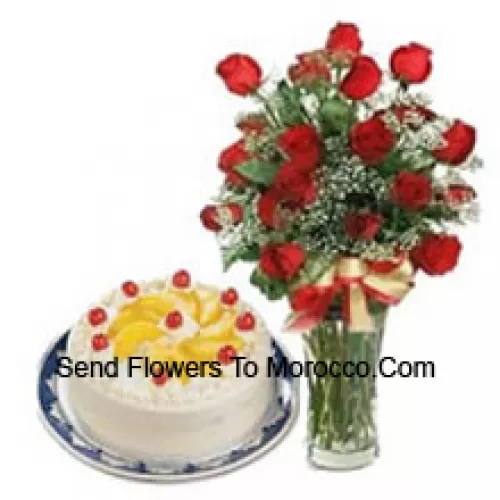 25 Red Roses With Some Ferns In A Glass Vase, A Cute Brown Teddy Bear And An Imported Box Of Chocolates