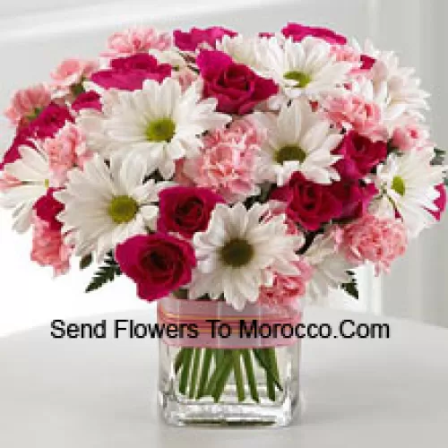 11 Red Roses, 11 White Daisies And 11 Pink Colored Carnations In A Glass Vase