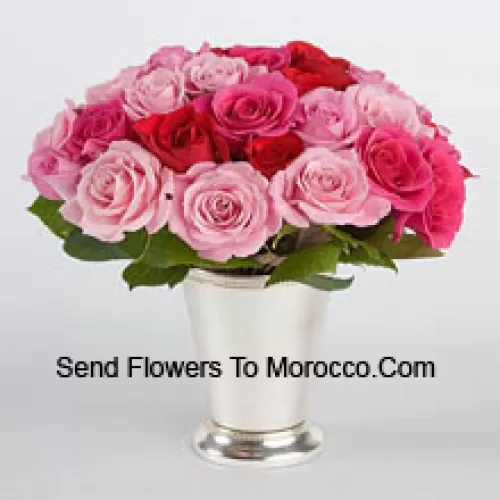 25 Mixed Colored Roses With Seasonal Fillers In A Glass Vase