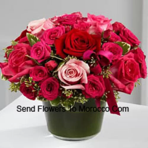 A Beautiful Basket Of Red, Dark Pink And Light Pink Roses. This Basket Has In Total 24 Roses.