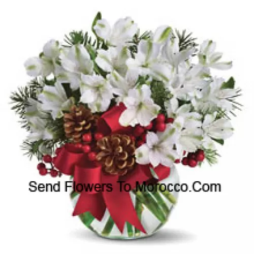 Share the magic of a white Christmas with this cheery bouquet of snowy white alstroemeria blossoms arranged in vase with festive holiday trim. (Please Note That We Reserve The Right To Substitute Any Product With A Suitable Product Of Equal Value In Case Of Non-Availability Of A Certain Product)