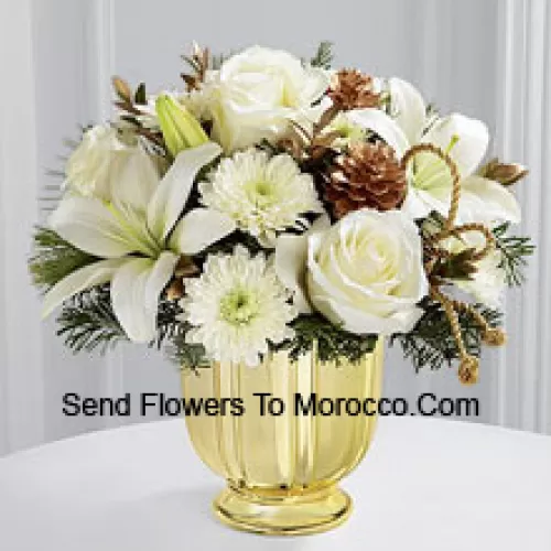 A highly sophisticated expression of the season's most dazzling moments. Snowy white roses, Asiatic lilies and chrysanthemums shed their light and beauty arranged amongst myrtle stems and assorted holiday greens. Accented by gold pinecones and gold cording and placed in a gold pedestal vase, this bouquet creates a wonderful wish for a truly wondrous holiday season. (Please Note That We Reserve The Right To Substitute Any Product With A Suitable Product Of Equal Value In Case Of Non-Availability Of A Certain Product)