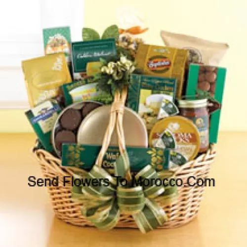 Start a tradition of sending good taste to everyone on your holiday gift list this year. Our classic wicker basket comes piled high with a gourmet assortment that is sure to please. Whether you need something to send to corporate clients or your favorite aunt and uncle, this gift basket is up to the job. We accent the basket with green and gold ribbon and holiday accents to make a great impression. Inside your recipients will discover an assortment that features something for everyone: Lindt chocolate truffles, smoked almonds, walnut cookies, chocolate cookies, chocolate-covered popcorn, cheese, crackers, a Ghirardelli chocolate bar, tortilla chips, salsa, chocolate wafer cookies , cheese swirls, and chocolate-covered sandwich cookies. (Please Note That We Reserve The Right To Substitute Any Product With A Suitable Product Of Equal Value In Case Of Non-Availability Of A Certain Product)