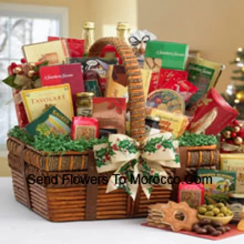 Send your best wishes with this impressive gift basket that's all decked out for the holidays. With the artful details of the handsomely crafted basket and the world of fancy flavors nestled inside, it festively captures the spirit of the season. The small includes a bountiful assortment with Tomato Basil Pretzels, Gingerbread Cake, Zesty Cheddar Thins, Spanish Olives, Pecan Pralines, Gouda Cheese Biscuits, Cinnamon Star Cookies, Belgian Chocolate Petites, California Smoked Almonds, Rothschild Triple Berry Preserves, Chocolate Chip Cookies, Ashby Assam Tea, Savory Snack Mix, Fruit Bonbons, Holiday Blend Coffee, and Godiva Milk Chocolate Strawberries. (Please Note That We Reserve The Right To Substitute Any Product With A Suitable Product Of Equal Value In Case Of Non-Availability Of A Certain Product)