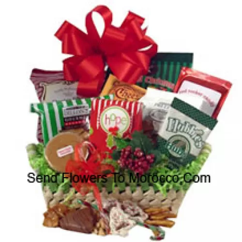 Celebrate holiday traditions with a gift that boasts good taste! The festive natural basket is packed full of delicious time-honored treats. We've included peanuts, fudge, pretzels, cheddar biscuits, cookies, snack mix, peanut brittle, sprinkled pretzels, Christmas popcorn and chocolate filled peppermints. We've also included a keepsake tree ornament to top off this heartfelt holiday gift. (Please Note That We Reserve The Right To Substitute Any Product With A Suitable Product Of Equal Value In Case Of Non-Availability Of A Certain Product)